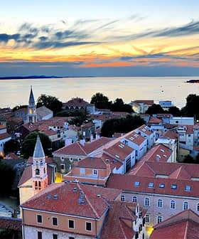 Aerial view of Zadar city with rooftops and the sea during sunset. - Olive Oil Times
